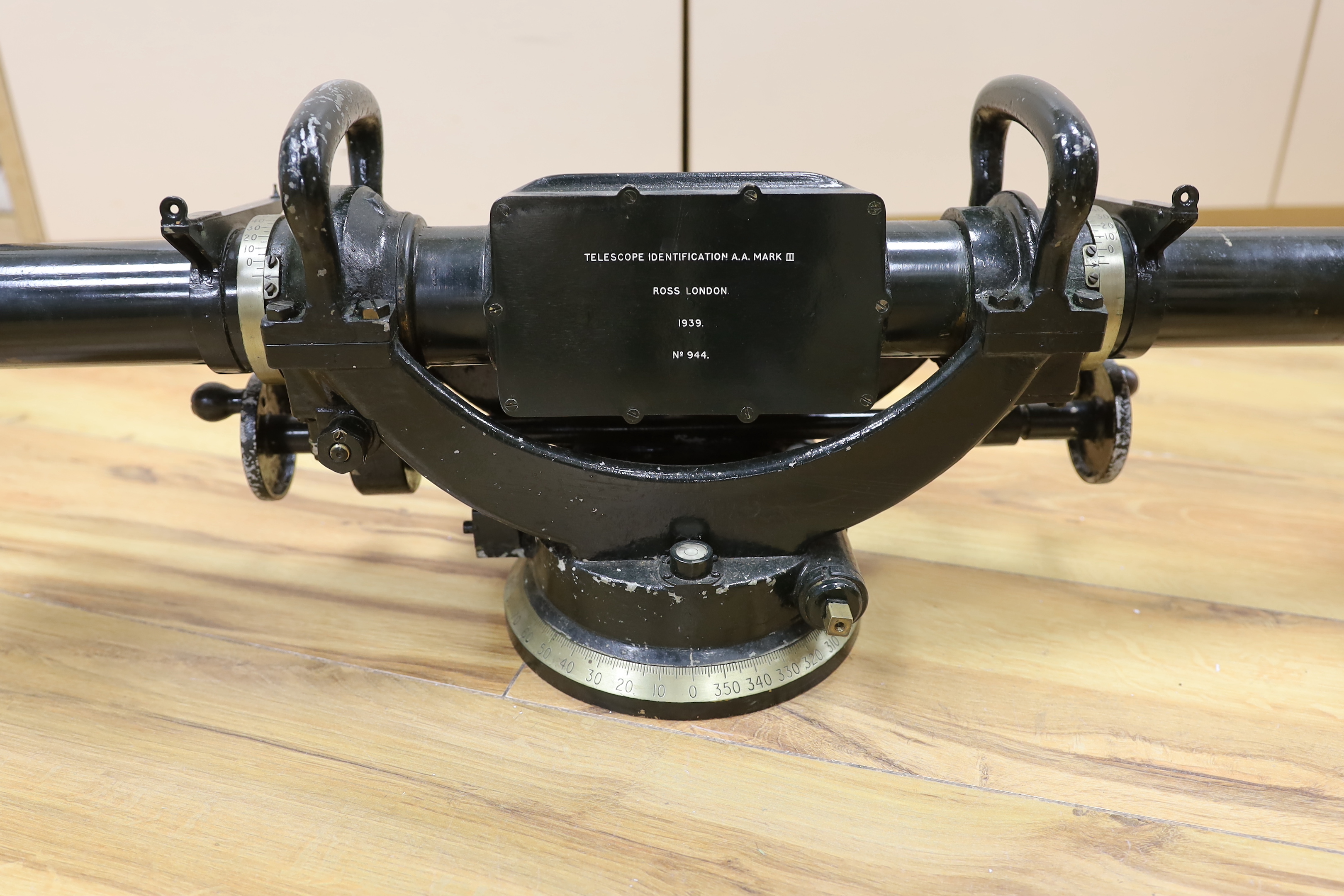 A WWII Telescope Identification A.A. Mk. III binocular sight (Rangefinder) in it’s original green-painted wooden transit case, case 88 x 30 x 35 cm
